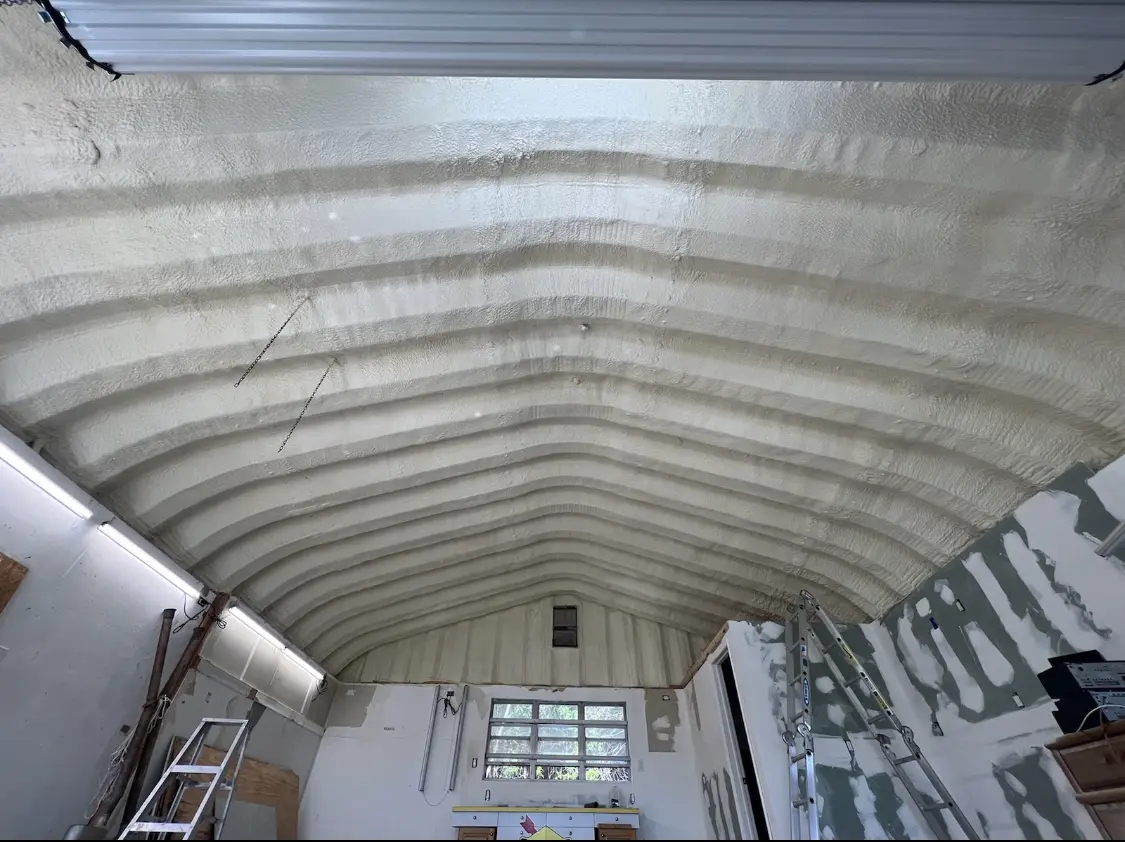 Spray polyurethane foam applied to the underside of a metal roof deck in Vineyard